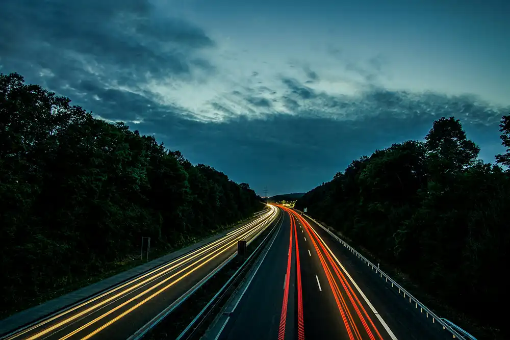 Image of a highway at night